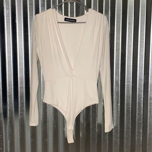 Naked wardrobe off white bodysuit